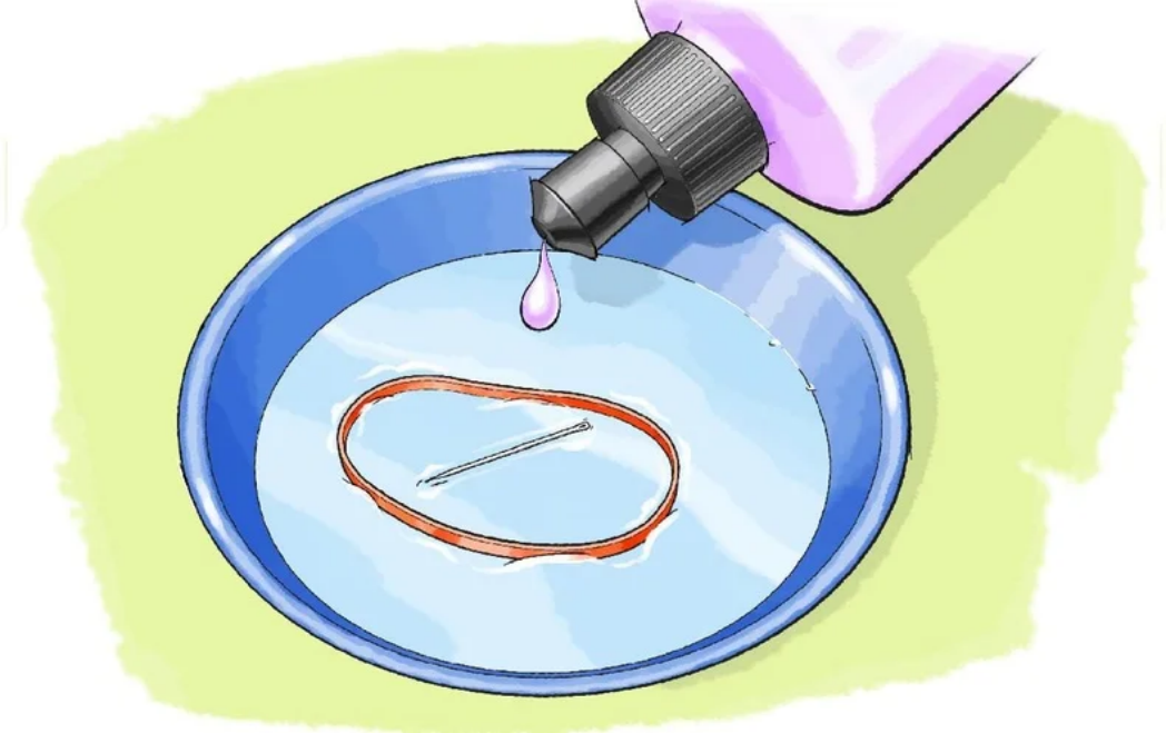 Fill a small bowl with warm water and add a liquid makeup remover.